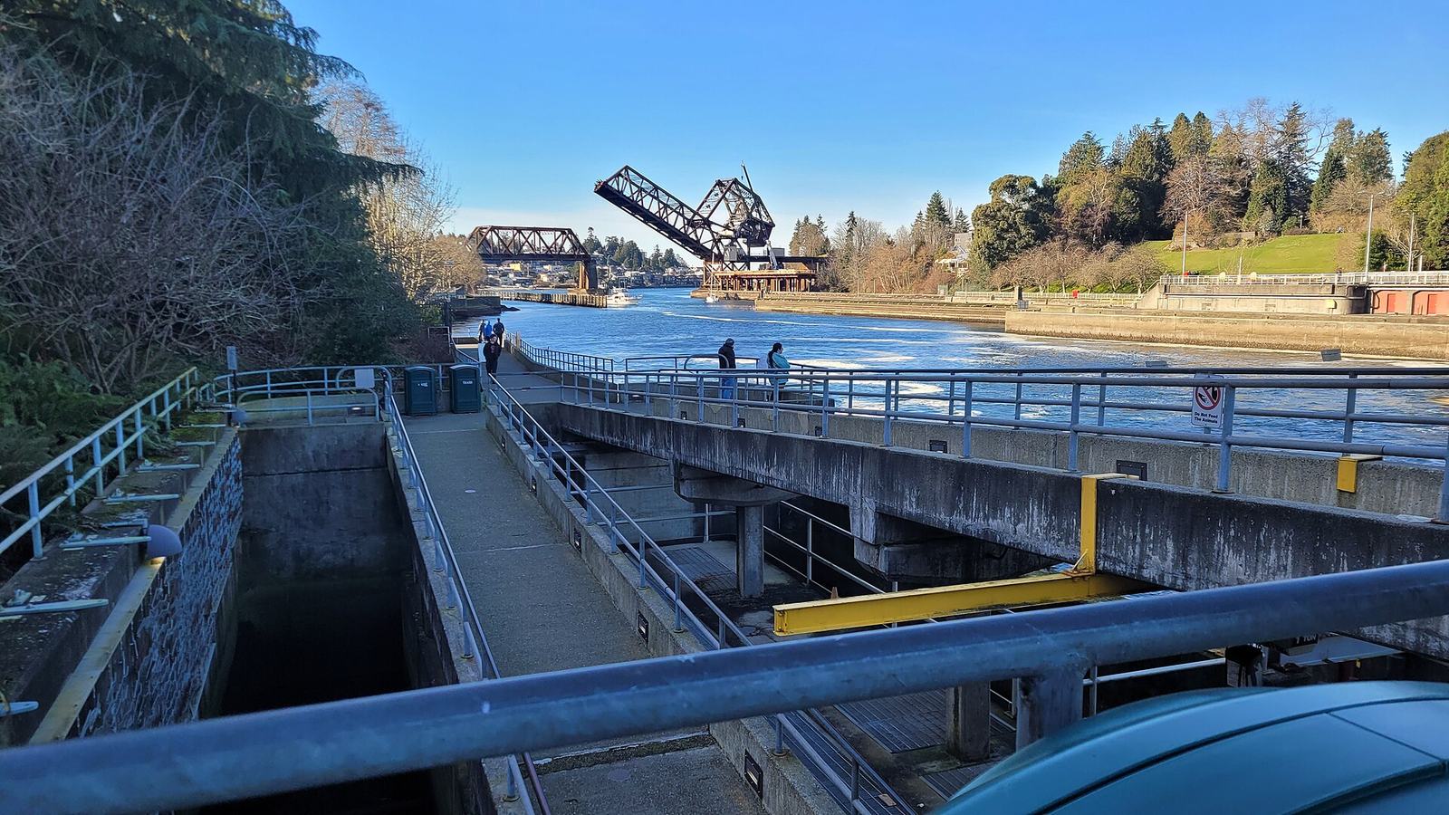 The Ballard Locks with the Salmon Bay railway bridge raised behind them